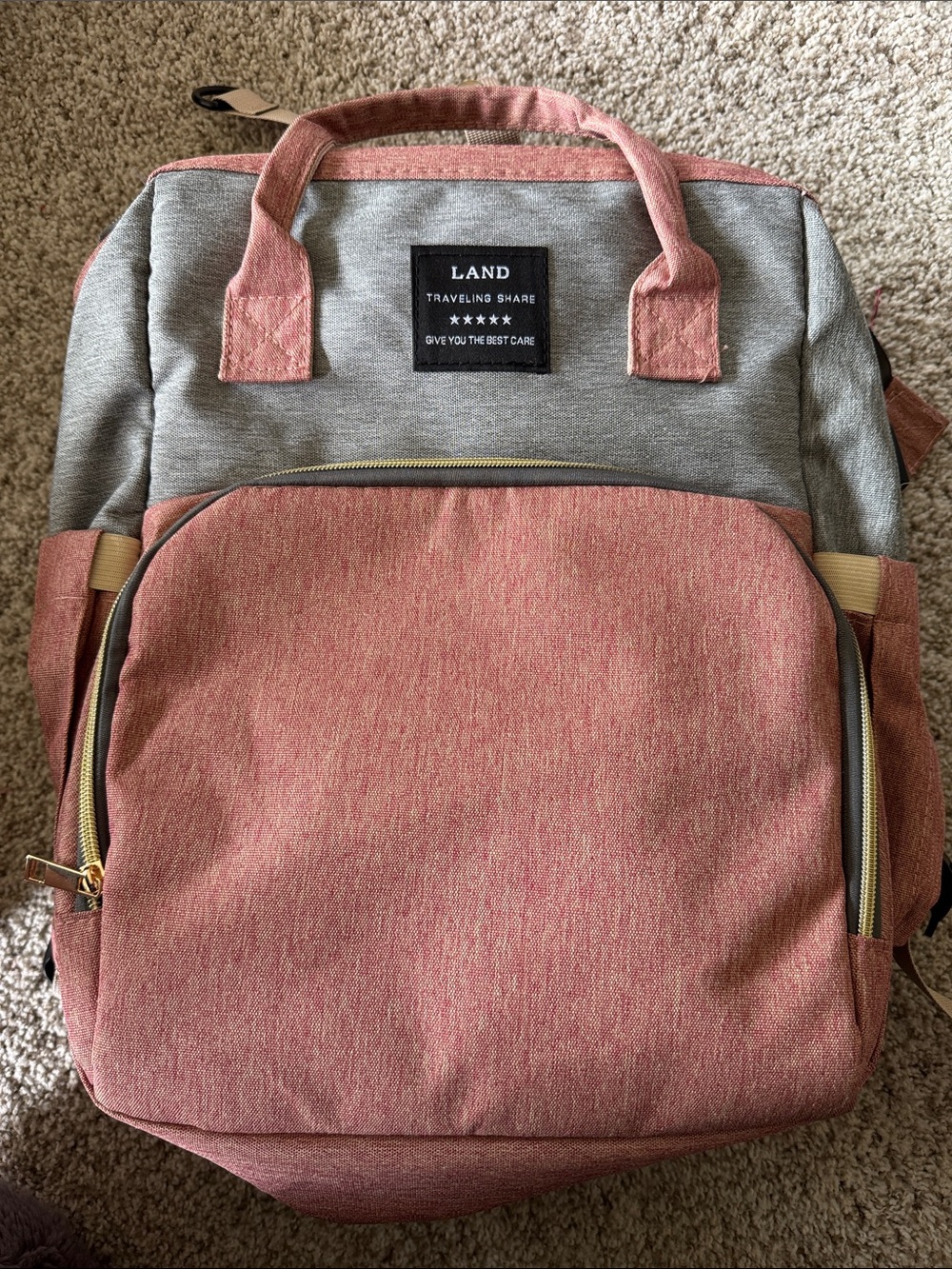 LAND backpack with fold out changing pad.  Two-Tone Grey and Pink Backpack